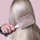 Cepillo alisador diseñado para desenredar sin dolor todo tipo de cabello, húmedo o seco